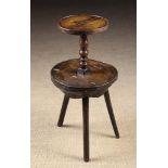 A Rustic Two Tiered Oak Table Circa 1700.
