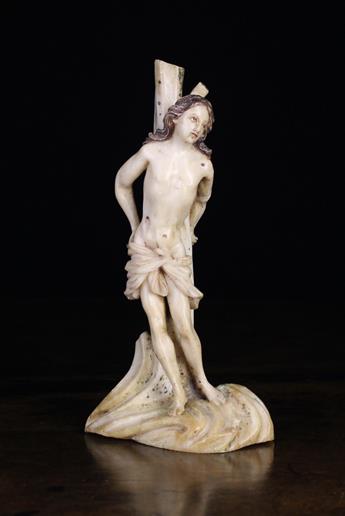 A 16th/17th Century Portuguese Alabaster Carving of Saint Sebastian tied to a tree.