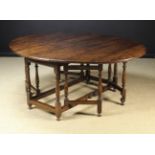 A Large 18th Century Yew-tree Gateleg Table.