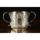 A Queen Anne Silver Loving Mug by John Wisdorne hallmarked London 1707.