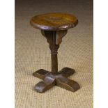A 17th Century Oak Low Candlestand.