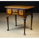 An 18th Century Oak Lowboy.