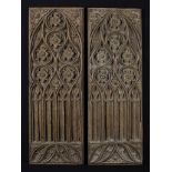 A Pair of 16th Century Dry Oak Panels carved with Gothic tracery, 19 in x 6½ in (48 cm x 16.5 cm).