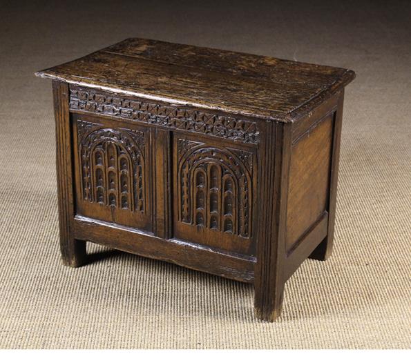 An 18th Century Child's Oak Coffer. The