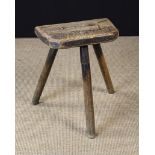 A 19th Century Rustic Milking Stool. The