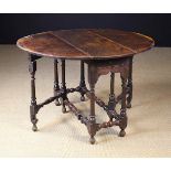 An 18th Century Oak Gateleg Table. The o