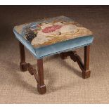 A 19th Century Upholstered Stool. The sq