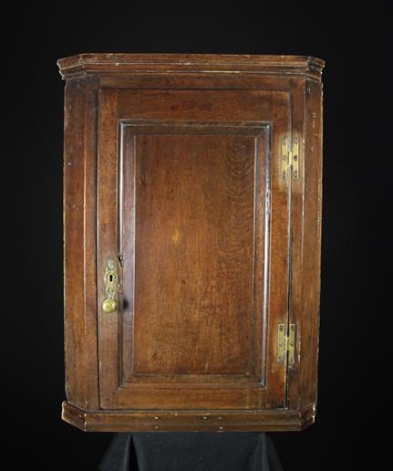 An 18th Century Oak Hanging Corner Cupbo