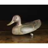 A Vintage Painted Wooden Decoy Duck with