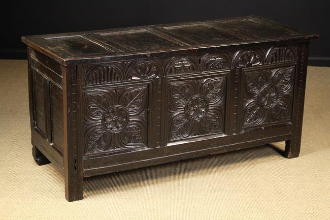 A 17th Century Carved Oak Coffer dated 1