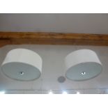 A pair of Dar Lighting's Zaragoza style three light cream ceiling pendants,