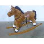 A child's modern rocking horse by Mulholland and Bailie - Height 92cm