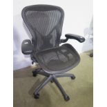 An ergonomic modern designer office chair