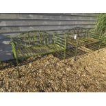 A pair of cast iron heavy decorative garden benches - Width 140cm each