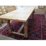 A pine farmhouse refectory table on heavy turned legs - Length 220cm x Width 90cm