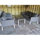 A new ex display Life all weather garden sofa with two armchairs and a coffee table