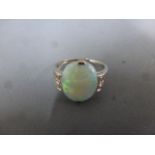 A platinum and white gold 18ct diamond and opal ring size K - opal approx 11mm x 10mm - approx