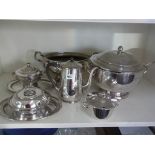 Eight pieces of Jesus College Cambridge plated table wear including a large lidded soup tureen and