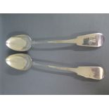 Two silver fiddle pattern serving spoons,