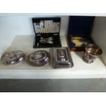 A selection of silver plated items including entree dishes and covers,