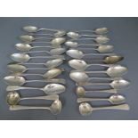 A quantity of silver hallmarked spoons, varying design and size - Weight approx.