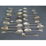 A quantity of silver hallmarked fiddle back spoons of varying size - Weight approx. 13 troy oz.