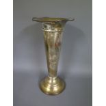 A silver hallmarked weighted trumpet vase - Height 20cm - some denting to top
