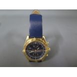 A gentleman's 18ct gold Breitling chronomat chronograph wristwatch,