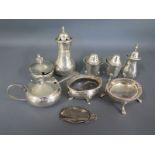 A quantity of silver hallmarked peppers, salts and mustards - Weight approx.