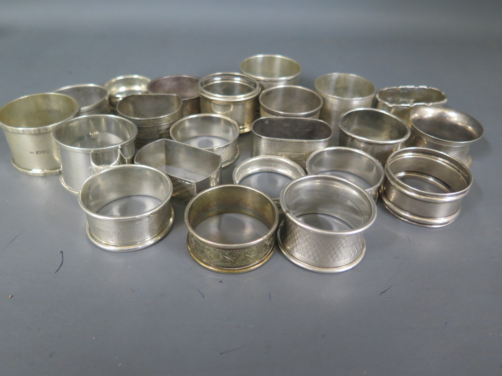 Twenty two silver hallmarked napkin rings, varying design and size - Weight approx. - Image 2 of 2