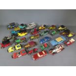A collection of diecast cars including Corgi, Lesney,