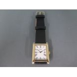 A Rotary gents 9ct yellow gold cased wristwatch, white enamel dial with Roman numerals,