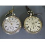 Two silver cased open faced pocket watches, both with Roman numerals to white enamel dials,