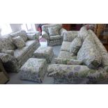 Two Rhodabourne three seater sofas, a single armchair and two stools - Cost New in excess of £10,