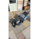 A MacAllister petrol driven lawn mower with a Briggs and Stratton 500 series 158cc engine 46hp 1.