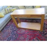 A light oak single drawer sidetable - 120cm x 79cm x39cm