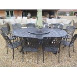 A Bramblecrest Milan elliptical oval table with 100cm lazy susan, ten armchairs,