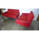 A pair of Fritz Hansen by Arne Jacobsen 3300 series chrome and red material sofas bought in 2005