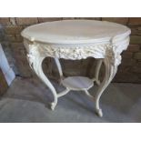 A painted shabby chic carved window table with an under tier - height 72cm x 76cm x 49cm