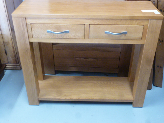 An oak ex display two drawer console table - Width 90cm x Depth 30cm x Height 77cm