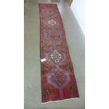 A handknotted woolen Azarbaijan runner 2.95m x 0.