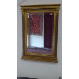 A gilt framed bevelled wall mirror - Width 71cm x Height 103cm