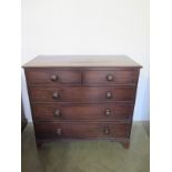 A 19th century mahogany chest with two short over three long drawers on bracket feet - Height 95cm
