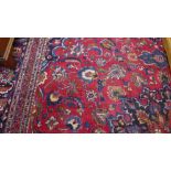 A Meshed hand knotted woolen rug - 370cm x 270cm