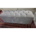 An upholstered footstool - Width 120cm