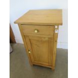 Stripped and waxed pine bedside cupboard with single door and drawer - 75cm x 42cm