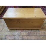 A Victorian stripped and waxed pine linen chest mounted on castors - Height 49cm x Width 96cm
