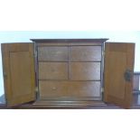 An oak collectors cabinet with five drawers - Height 35cm x 39cm x 21cm