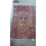 A handknotted woolen Hamadan rug - 2.06m x 1.