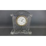 A Waterford crystal cased mantle clock with Roman numerals to white dial